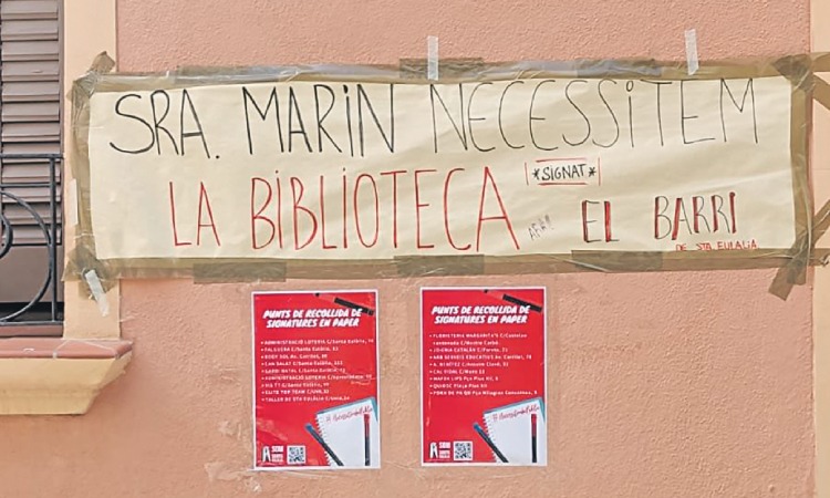 Pancarta de reclam obertura biblioteca Santa Eulàlia