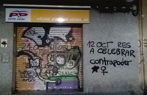 Fan un grafiti a la seu del PP en protesta pel 12 d’octubre